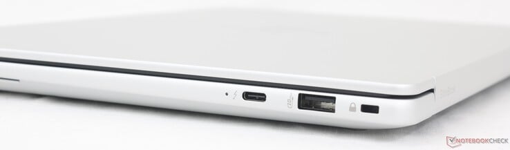 Direito: USB-C Thunderbolt 4 com DisplayPort 2.1 + Power Delivery (40 Gbps), USB-A (10 Gbps), trava de segurança