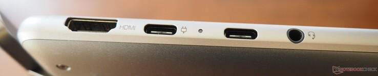 Lado esquerdo: HDMI 2.1, USB-C 3.1 (DP 1.3, PD), USB-C 4 (DP 1.4, PD), conector de 3,5 mm (entrada/saída de linha)