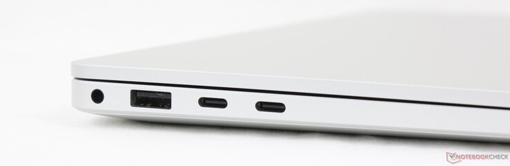 Esquerda: áudio de 3,5 mm, USB-A 3.2 Gen.1 (5 Gbit/s), 2x USB-C 4.0 (40 Gbit/s, modo DisplayPort ALT, Power Delivery)